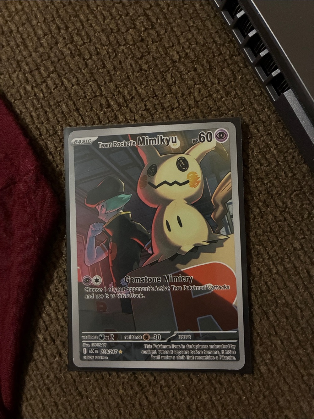 Team Rocket's Mimikyu Holographic Trading Card - Yellow/Black